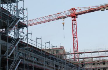 Construction work crane building house